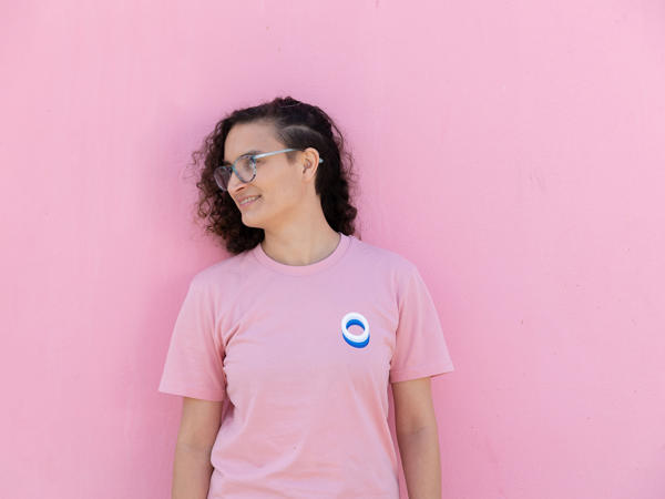 a woman in a pink shirt